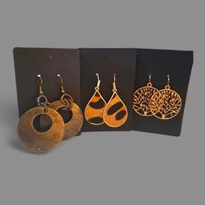 3 pairs of dangling earrings.